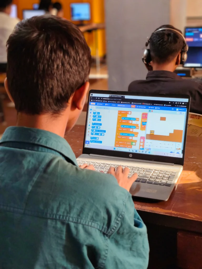 Student Learning Scratch Game Development